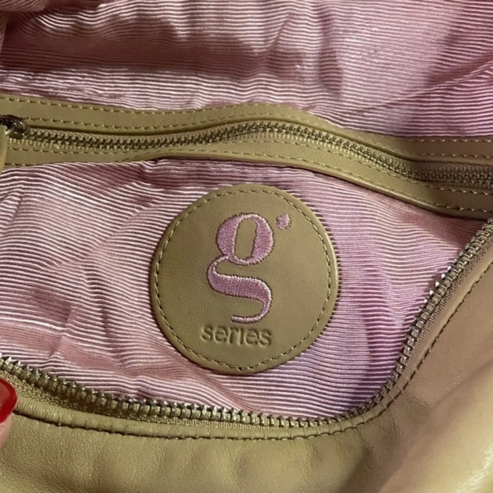 G series camel faux leather hobo purse with large silver decorative studs